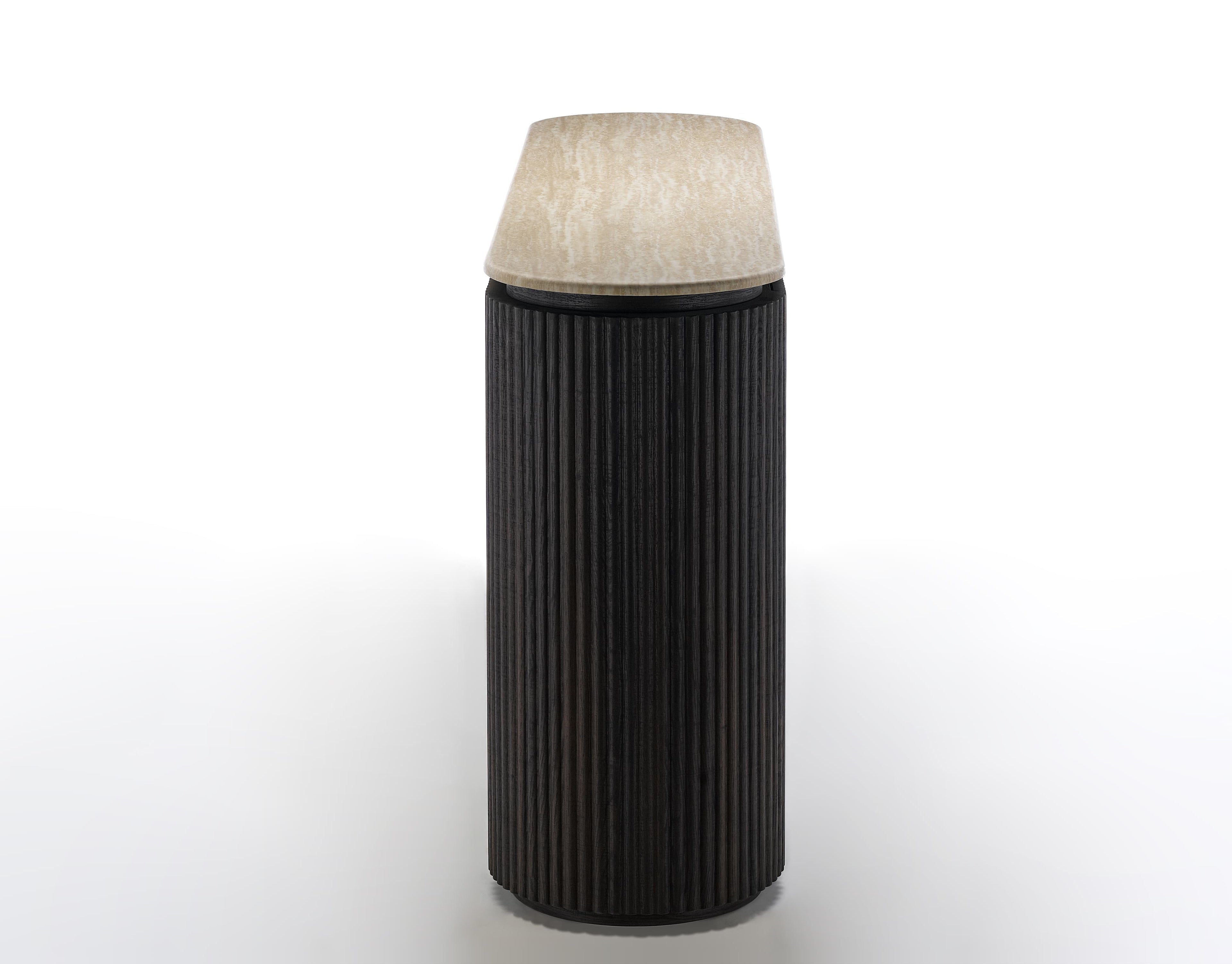 Black cylindrical lamp with textured white shade on a white background
