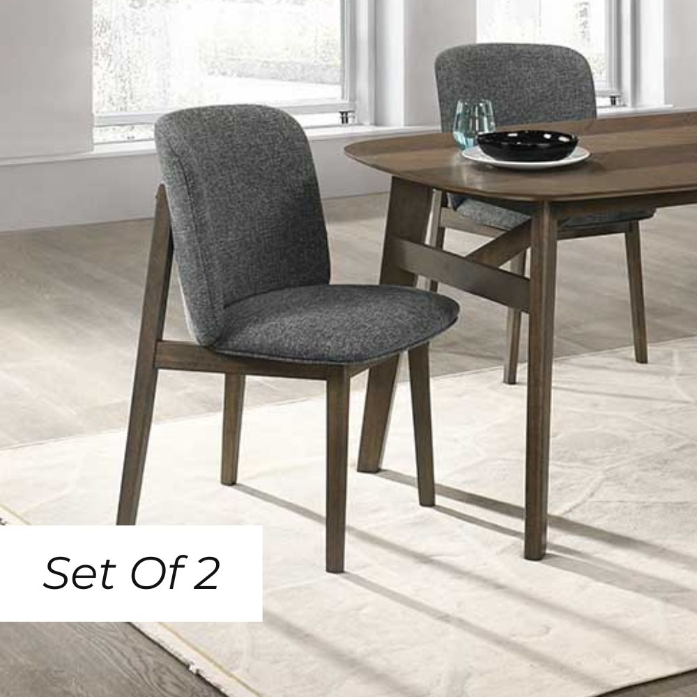 A set of two Alice Dining Chairs with a wenge finish and gray upholstered seats, placed around a wooden dining table.