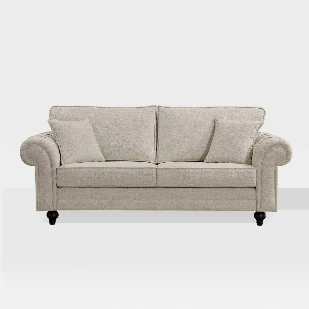 A three-seater cream sofa with padded cushions and wooden legs.