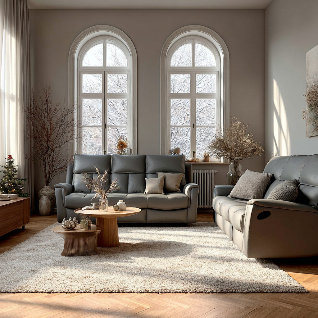 Modern living room with gray sofas, a wooden coffee table, and decorative elements.