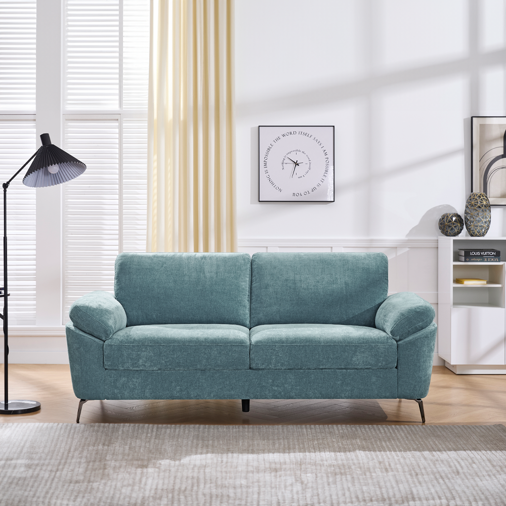 teal 3 seater sofa in a minimalist living room