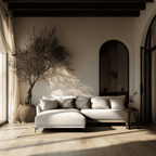 Modern living room with a white sectional sofa, potted plant, and arched doorway.