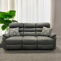 A antique grey leather air fabric 3-seater recliner sofa with multiple cushions, placed in a showroom setting with a large window and a green potted plant in the background.