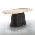 Modern table with a wooden top and textured dark base on a white background