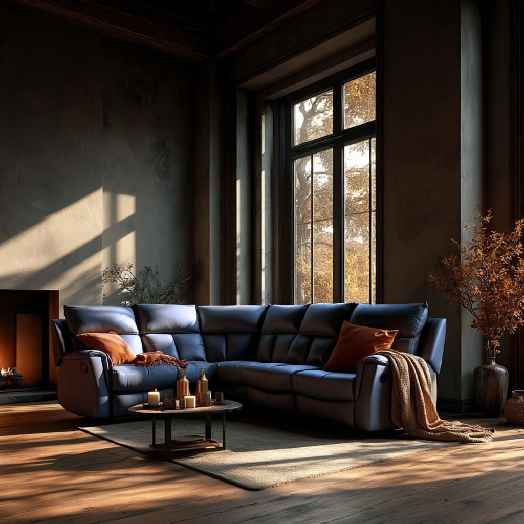 Cozy living room with a dark blue sectional sofa, wooden coffee table, and large windows.