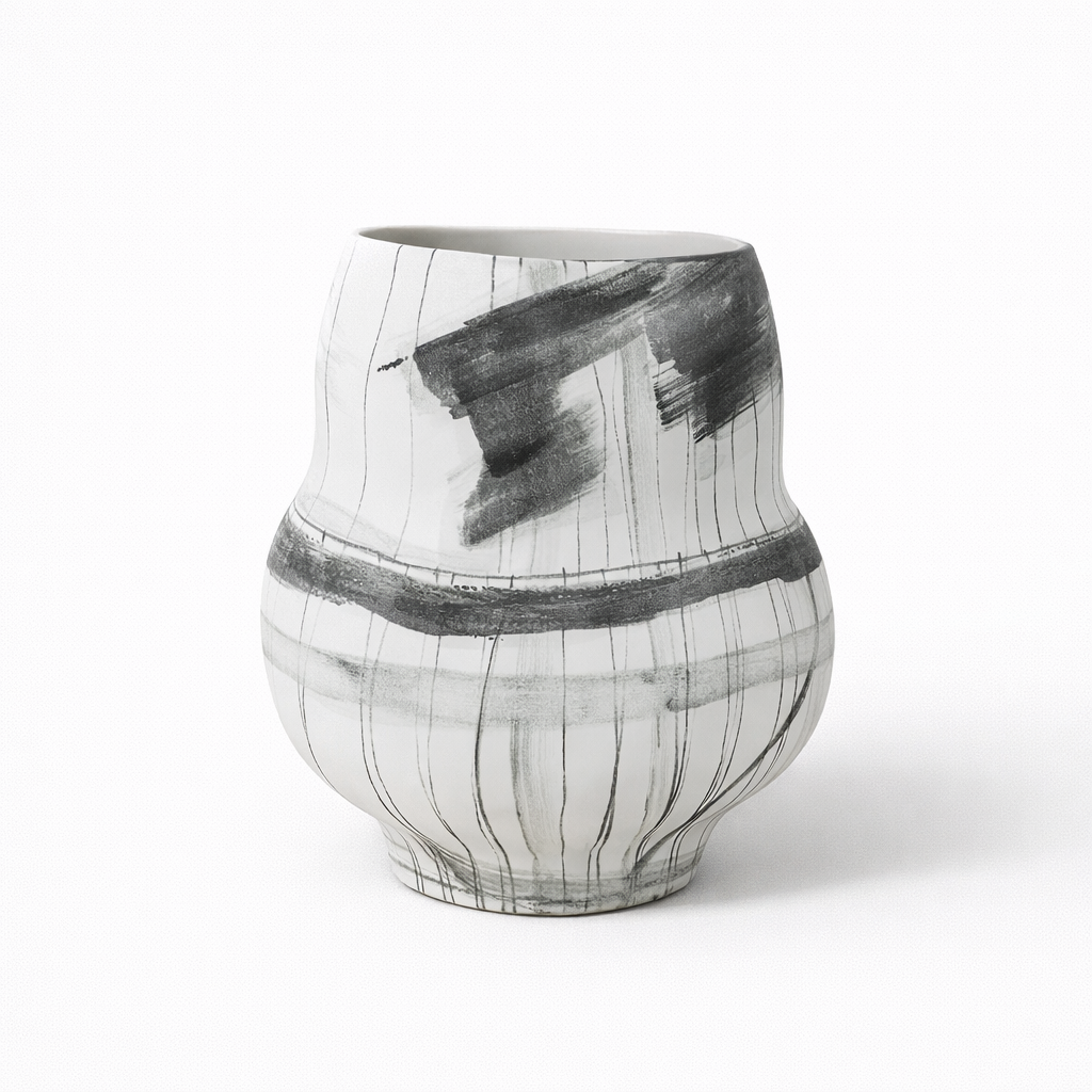 Black and white ceramic vase on a white background