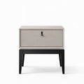 Modern nightstand with a single drawer on a white background