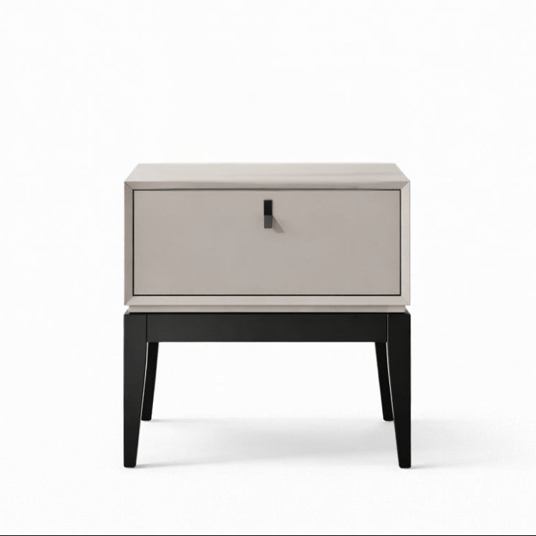 Modern nightstand with a single drawer on a white background