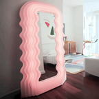 pink floor mirror with wave pattern in aa bedroom